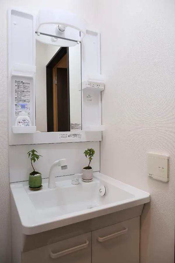 Holiday home 南2条蒼龍 希少な最大18名様ご宿泊可能の大豪邸 駅徒歩6分 無料駐車場4つ付き Japan